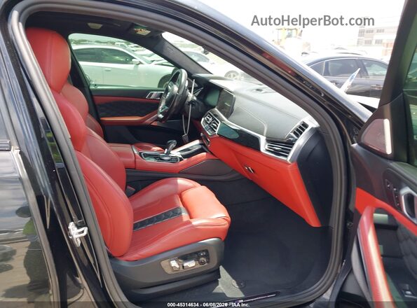 5YMCY0C01L9D13554 2020 BMW X6 M Черный Вид салона спереди