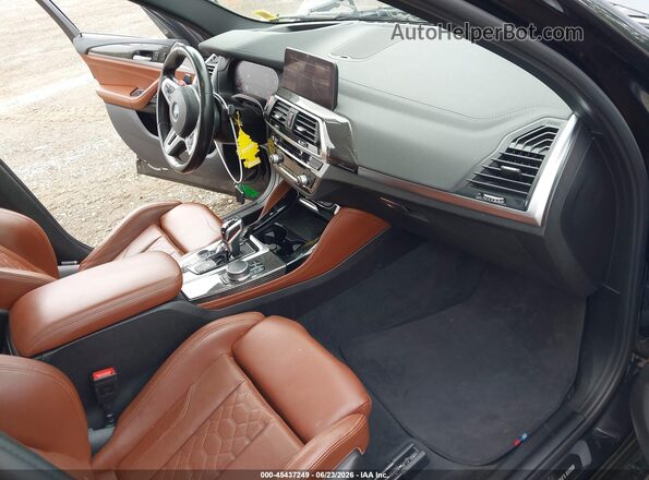 5YMTS0C01M9E99535 2021 BMW X3 Black Vista interior delantera