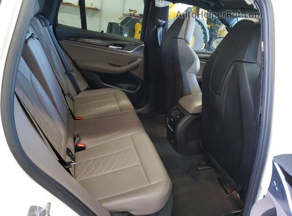 5YMTS0C02LLT10678 2020 BMW X3 White Вид задньої частини салону
