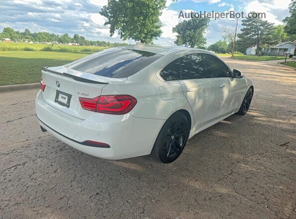 WBA4J1C53JBA30076 2018 BMW OTHER White Vista frontal