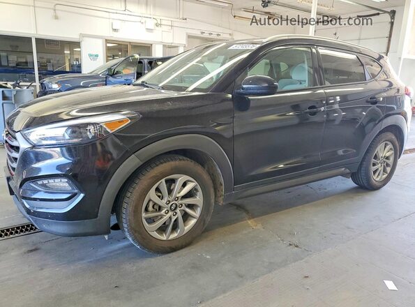 KM8J3CA49GU142764 2016 HYUNDAI TUCSON Black 