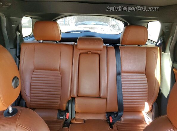SALCT2BG9GH575034 2016 LAND ROVER DISCOVERY Black უკანა სალონის ხედი