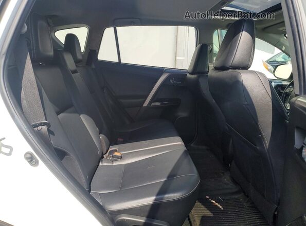 JTMDFREVXGJ054886 2016 TOYOTA RAV4 White 