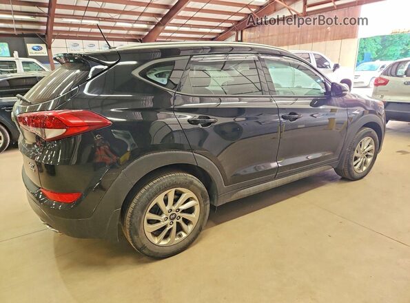 KM8J3CA22GU043878 2016 HYUNDAI TUCSON Черный Передняя правая четверть