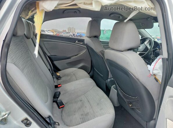 KMHCT4AE4GU942685 2016 HYUNDAI ACCENT Silver Rear interior view