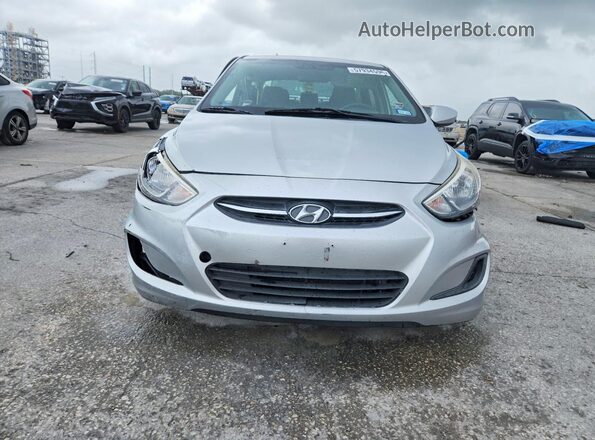 KMHCT4AE4GU942685 2016 HYUNDAI ACCENT Silver Rear view