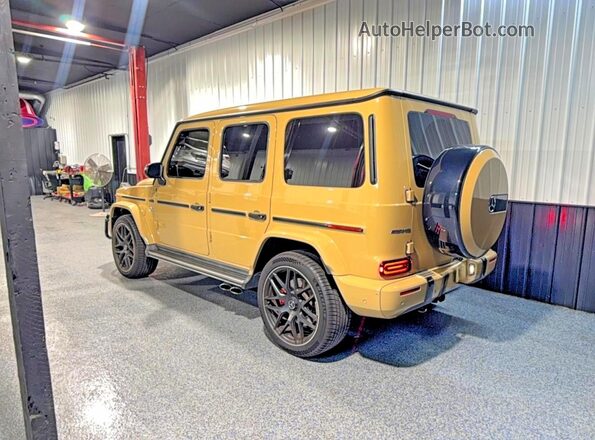 W1NYC7HJ5MX389465 2021 MERCEDES-BENZ G-CLASS Желто-коричневый Передняя правая четверть