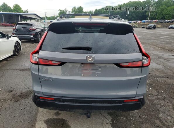2HKRS4H74PH436535 2023 HONDA CRV Серый Вид салона спереди