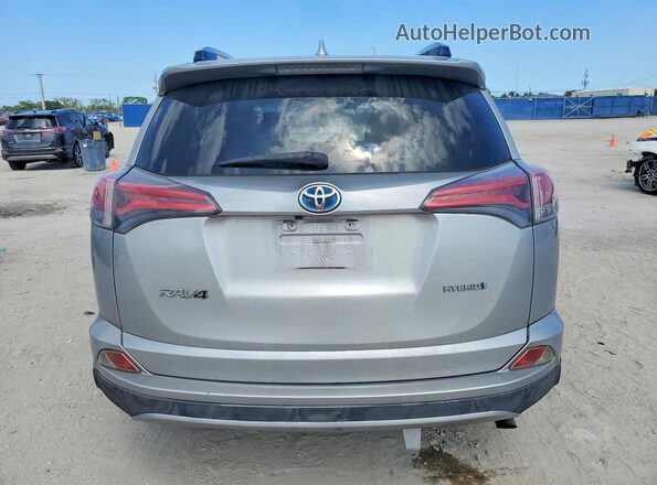 JTMRJREV5JD213856 2018 TOYOTA RAV4 Серебряный Вид салона спереди