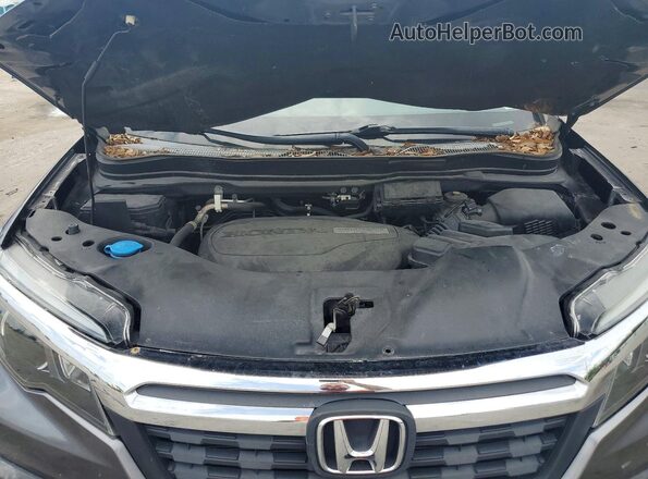 5FPYK2F66JB002673 2018 HONDA RIDGELINE Gray Rear interior view