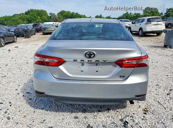 4T1B11HK3KU261325 2019 TOYOTA CAMRY Silver Vista interior delantera