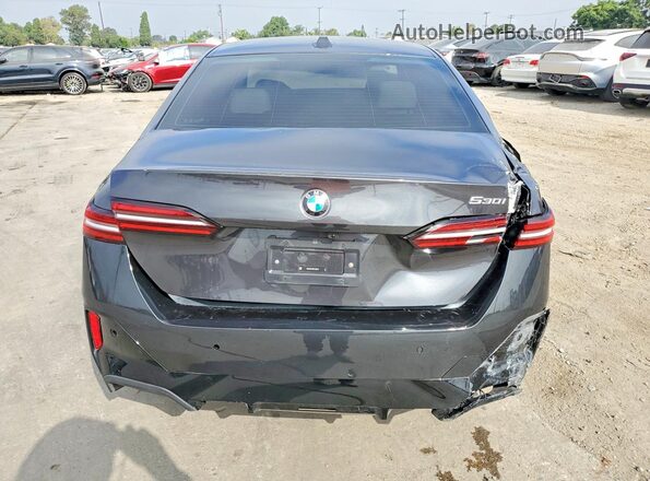 WBA43FJ07SCU32819 2025 BMW 5 SERIES Charcoal Front interior view