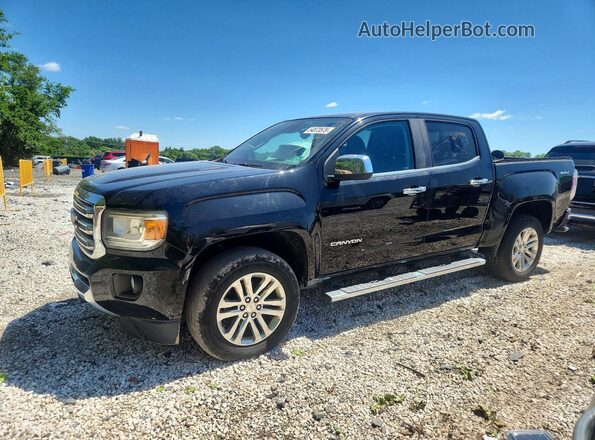 1GTP6DE14G1321419 2016 GMC CANYON Black Trasero izquierdo