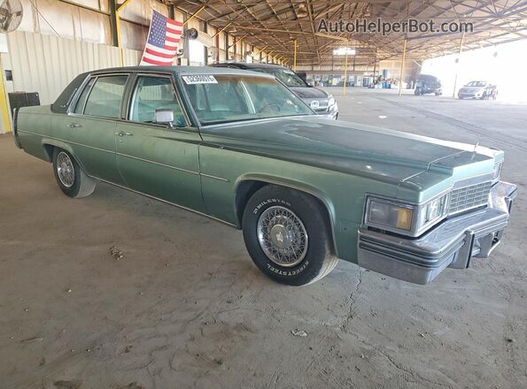 6D69S7Q312511 1977 CADILLAC DEVILLE Green Front right