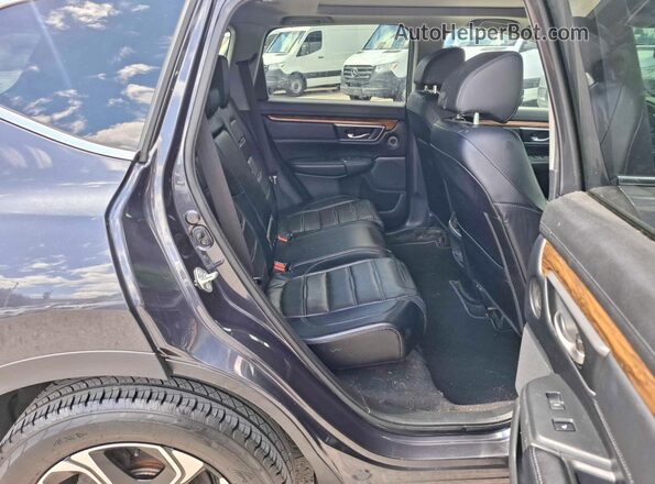 2HKRW2H9XHH136588 2017 HONDA CR-V Серый Вид салона спереди
