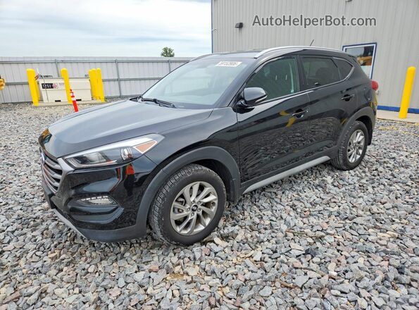 KM8J3CA23HU576503 2017 HYUNDAI TUCSON Black Rear left
