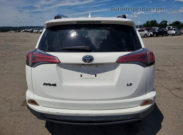 JTMZFREV5GJ080222 2016 TOYOTA RAV4 White Front interior view