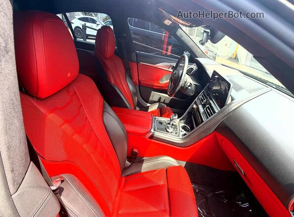 WBAGV8C09PCK90335 2023 BMW M8 Gray Rear view