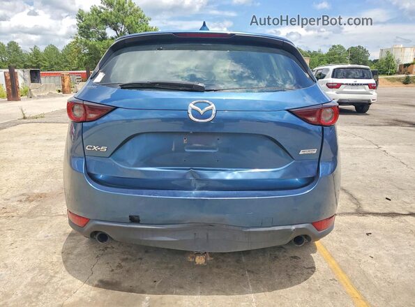 JM3KFABL8H0215813 2017 MAZDA CX-5 Blue Widok wnętrza z przodu