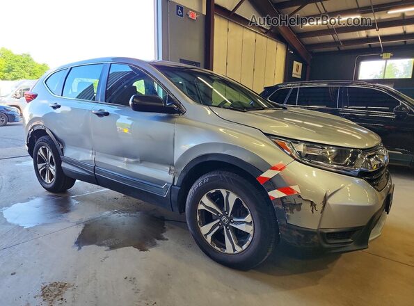 2HKRW6H3XJH201321 2018 HONDA CR-V Серебряный Вид спереди