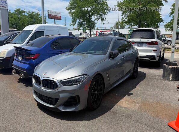 WBAGV8C09PCK90335 2023 BMW M8 Gray Rear right