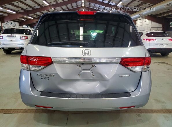 5FNRL5H35GB123444 2016 HONDA ODYSSEY Серебряный Вид салона спереди