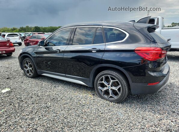 WBXHU7C30J3H43138 2018 BMW X1 Black Trasero derecho