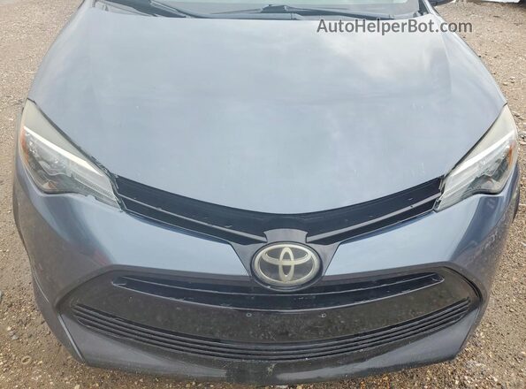 5YFBURHE1KP893323 2019 TOYOTA COROLLA Gray Вид підкапотного простору