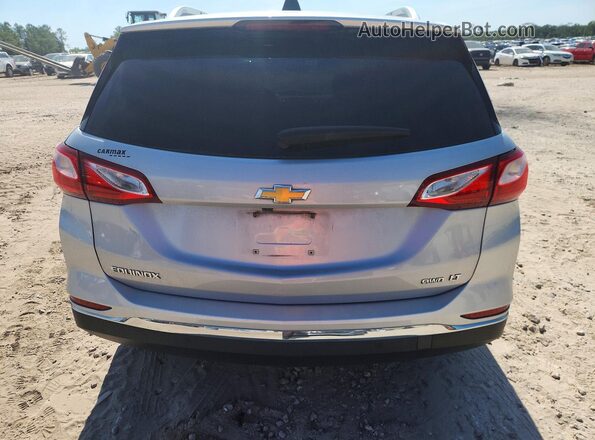 2GNAXSEV7J6227072 2018 CHEVROLET EQUINOX Silver Widok wnętrza z przodu