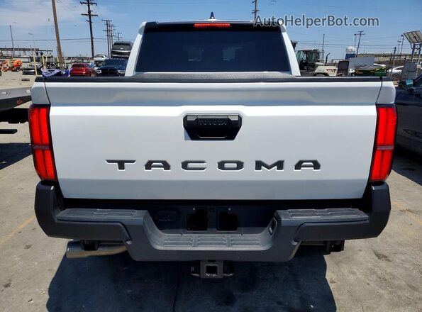 3TYKD5HN6ST019389 2025 TOYOTA TACOMA White Вид салону спереду