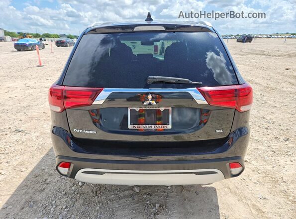 JA4AZ3A33LZ037896 2020 MITSUBISHI OUTLANDER Black Front interior view