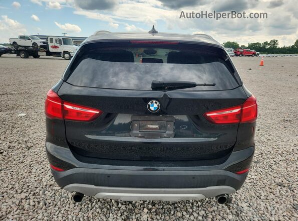 WBXHT3C32H5F74315 2017 BMW X1 Black Սալոնի դիմացի տեսք