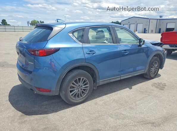 JM3KFBBM4M0334581 2021 MAZDA CX-5 Blue Delantero derecho