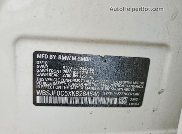 WBSJF0C5XKB284540 2019 BMW M5 White VIN კოდის სტიკერის ხედი