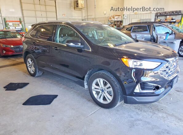 2FMPK4J90KBC09426 2019 FORD EDGE Black Widok z przodu