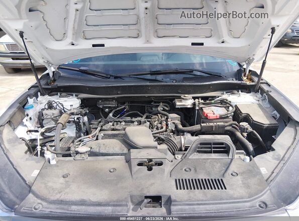7FARS3H71PE010699 2023 HONDA CR-V Cream Vista trasera