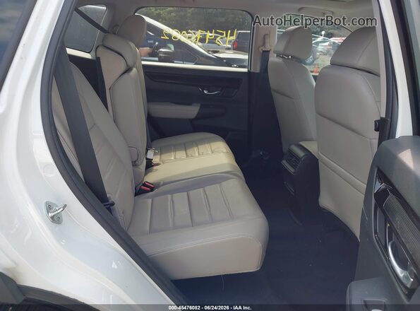 7FARS3H78PE011896 2023 HONDA CR-V White VIN sticker view