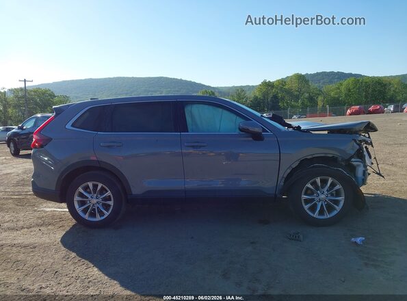 7FARS4H77PE014973 2023 HONDA CR-V Gray Vista interior trasera