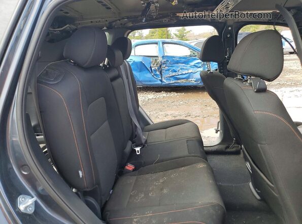 7FARS6H5XSE035934 2025 HONDA CR-V Charcoal Vista interior trasera