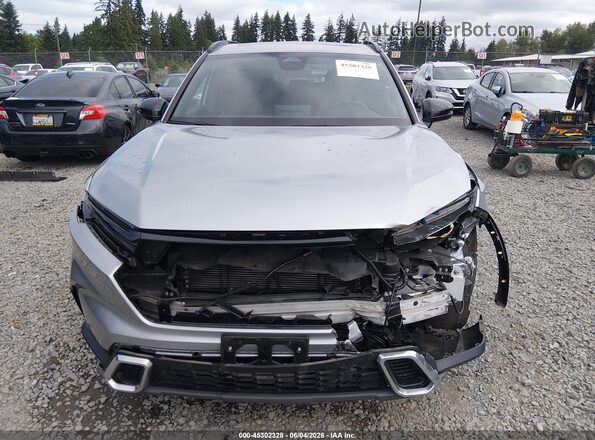 7FARS6H96PE018946 2023 HONDA CR-V Silver Rear interior view