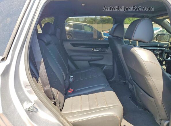 7FARS6H97PE021547 2023 HONDA CR-V Silver Rear interior view