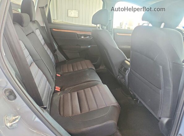 7FART6H56ME031380 2021 HONDA CR-V Blue Vista interior trasera