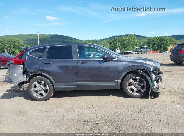 7FARW1H51JE033253 2018 HONDA CR-V Gray Widok wnętrza z tyłu