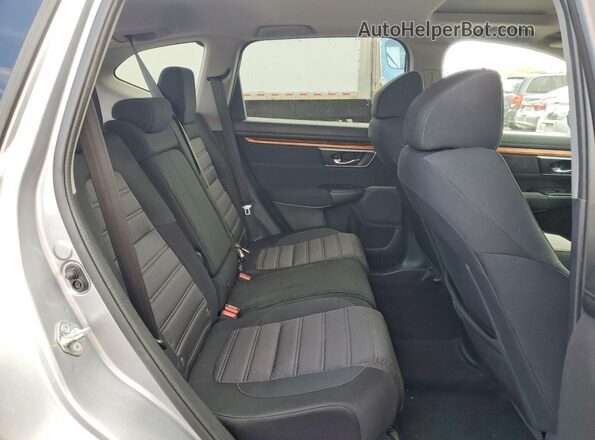 7FARW1H57HE044722 2017 HONDA CR-V Silver Widok wnętrza z tyłu