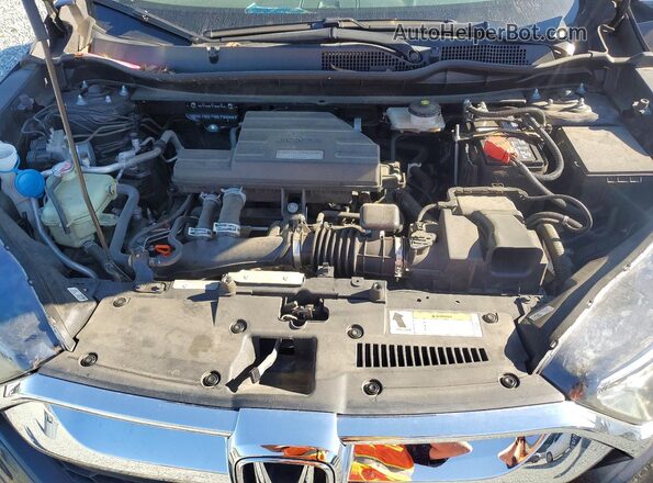 7FARW1H84HE020243 2017 HONDA CR-V Charcoal Widok wnętrza z tyłu