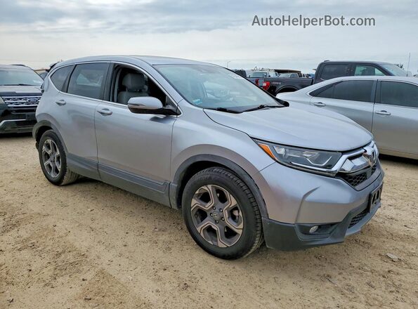 7FARW1H85JE030284 2018 HONDA CR-V Серебряный Передняя правая четверть