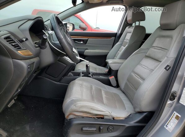 7FARW1H85JE030284 2018 HONDA CR-V Серебряный Вид салона спереди