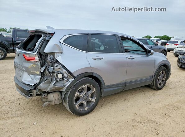 7FARW1H85JE030284 2018 HONDA CR-V Серебряный Задняя правая четверть
