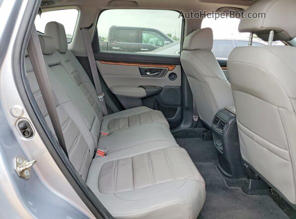 7FARW1H85JE030284 2018 HONDA CR-V Серебряный Вид задних сидений