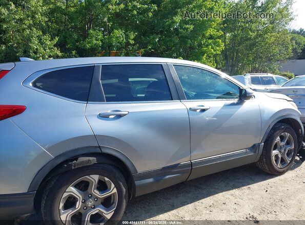 7FARW2H50JE088928 2018 HONDA CR-V Silver Widok wnętrza z tyłu